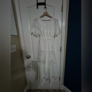 Bono style white dress